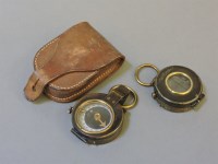 Lot 110 - Two brass compasses