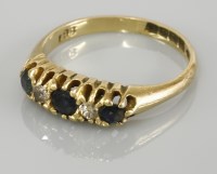 Lot 15 - An Edwardian 18ct gold sapphire and diamond boat shaped ring