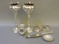 Lot 90 - A pair of silver flower vases