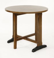 Lot 201 - An Art Deco walnut folding lamp table