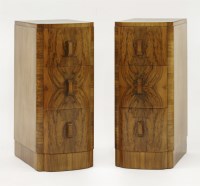 Lot 246 - A pair of Art Deco walnut three-drawer bedside chests
