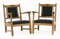 Lot 70 - A pair of oak low armchairs