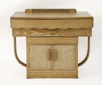 Lot 141 - An Art Deco limed oak side cabinet