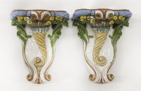 Lot 136 - A pair of Continental glazed wall brackets
