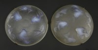 Lot 151 - A pair of Sabino 'Les Poissons' moulded opalescent glass plafonniers