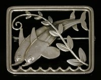 Lot 22 - A sterling silver dolphin plaque brooch by Georg Jensen