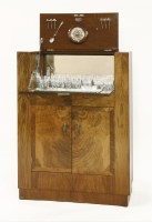 Lot 236 - An Art Deco burr walnut cocktail cabinet