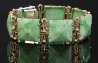 Lot 28 - A gold mounted jade plaque link bracelet