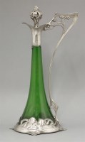 Lot 62 - An Art Nouveau WMF silver-plated and green glass claret jug and stopper