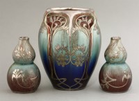 Lot 31 - A garniture of Art Nouveau vases