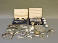 Lot 106 - A box of silver and plate