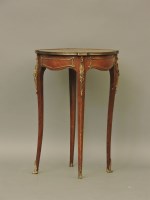 Lot 603 - A French brass mounted occasional table