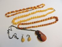 Lot 35 - Three amber bead necklaces