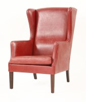 Lot 368 - A Danish crimson leather wing armchair