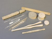 Lot 62 - A carved ivory needle case and contents