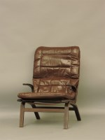 Lot 462 - A Danish 1960s dark bentwood leather cushioned armchair