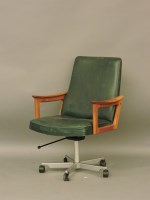 Lot 464 - A Danish teak and green leather swivel desk chair