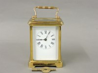 Lot 112 - A French brass carriage clock