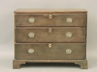 Lot 416 - A George III mahogany chest of three long drawers