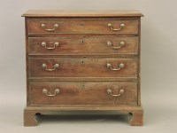 Lot 421 - A George III mahogany small chest of four long drawers