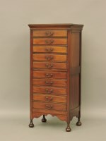 Lot 375 - An early 20th century music cabinet