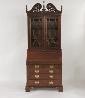 Lot 488 - A Georgian style mahogany bureau bookcase