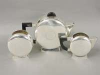 Lot 255 - A silver plated three piece teaset