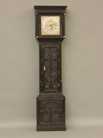 Lot 412 - An oak longcase clock