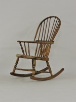 Lot 371 - A 19th century spindle back rocking chair