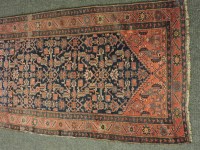 Lot 395 - A Persian runner