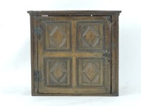 Lot 417 - An 18th century oak wall mounted cupboard