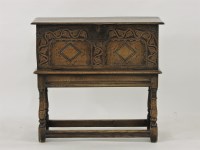 Lot 511 - A reproduction oak fall front chest