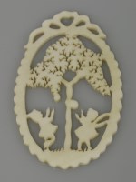 Lot 4 - A pierced and carved ivory pendant