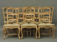 Lot 520 - A set of eight rush seated kitchen chairs