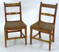 Lot 428 - A set of seven early 19th century elm country chairs