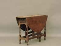 Lot 452 - An 18th century gate leg table