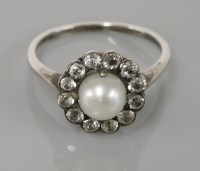 Lot 1 - A cultured pearl and synthetic spinel cluster ring