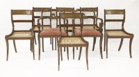 Lot 466 - A matched set of eight Regency simulated rosewood and brass inlaid dining chairs