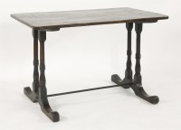 Lot 446 - A walnut tavern table