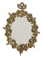 Lot 478 - A gilt bronze oval wall mirror