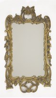 Lot 444 - A carved wood and gilt wall mirror