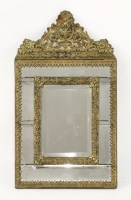 Lot 482 - A Flemish brass embossed wall mirror