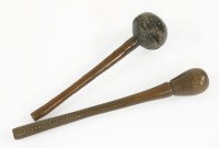 Lot 214 - Two Fijian ulas or throwing clubs