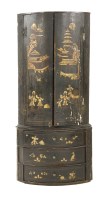 Lot 459 - A japanned hanging corner cupboard