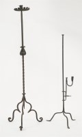 Lot 408 - An iron candlestand