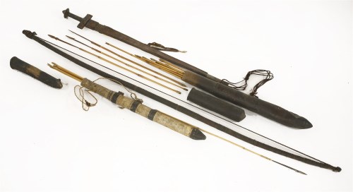 Lot 201 - A tribal bow and arrows