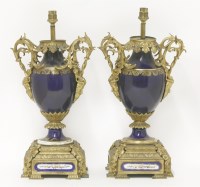 Lot 527 - A pair of Continental porcelain and gilt metal-mounted table lamps