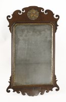 Lot 489 - A George III mahogany fret frame wall mirror