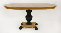 Lot 442 - A Biedermeier-style maple and ebonised centre table