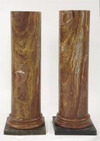 Lot 473 - A pair of red onyx marble columns